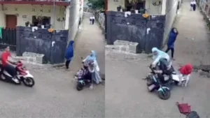 Viral! Bonceng Istri dan Anak Naik Motor Listrik, Pengendara Ojol Dikeroyok Sekelompok Orang